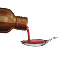 Pouring Cough Medicine