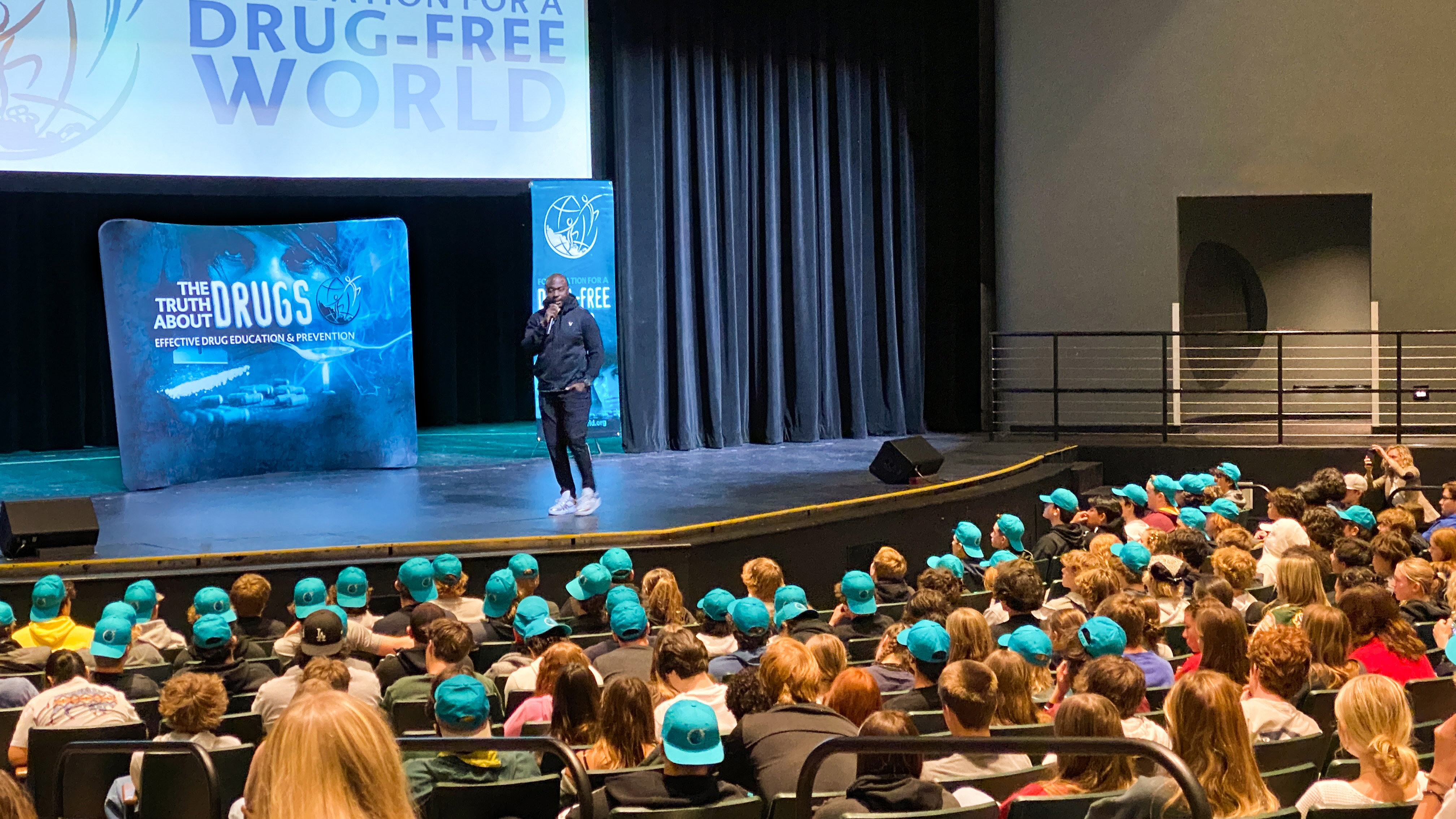 Marshall Faulk tells students to get the facts about drugs so they can make informed decisions.