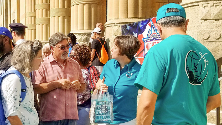Drug-Free World provides material at the launch of Buffalo’s National Night Out activities at City Hall.