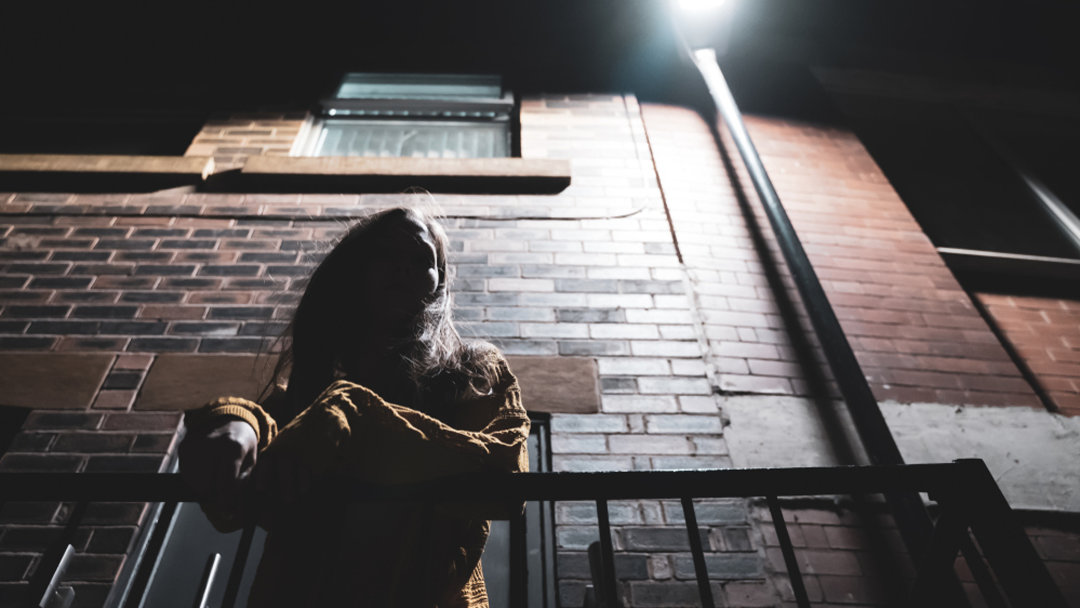 Woman on a dark street