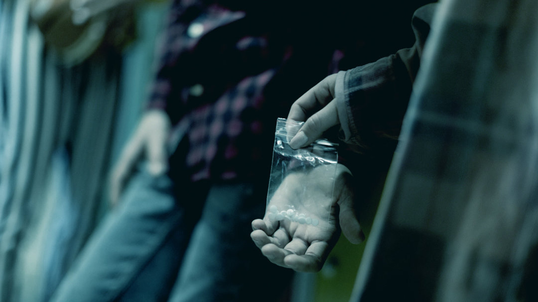 Teenagers dealing pills