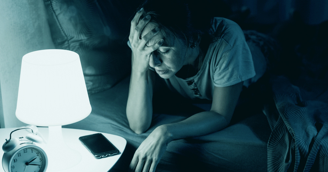 A woman not able to sleep