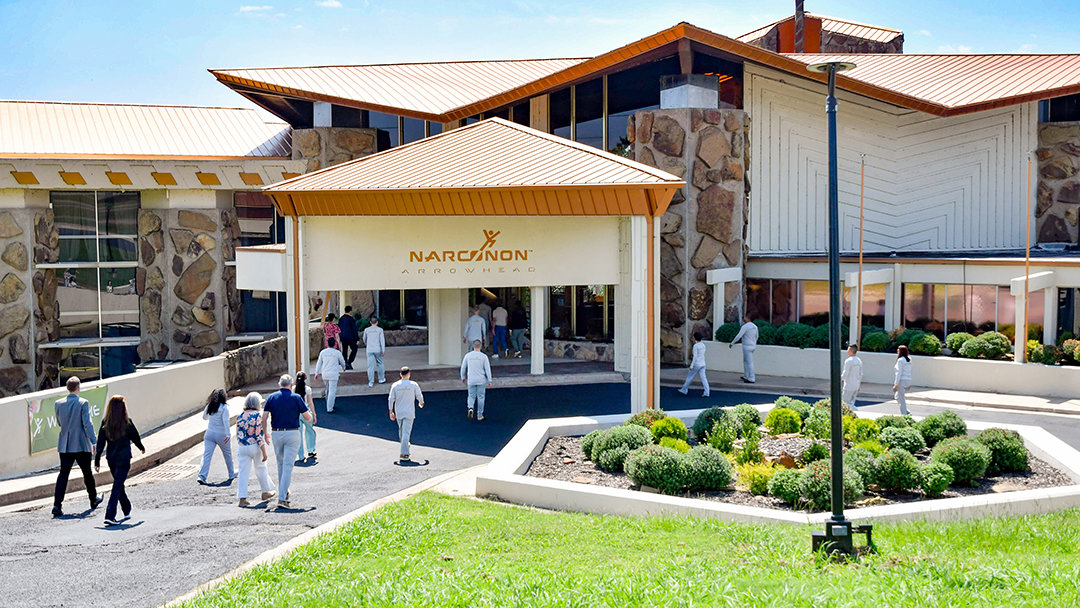 Narconon Arrowhead entrance, students and staff walking
