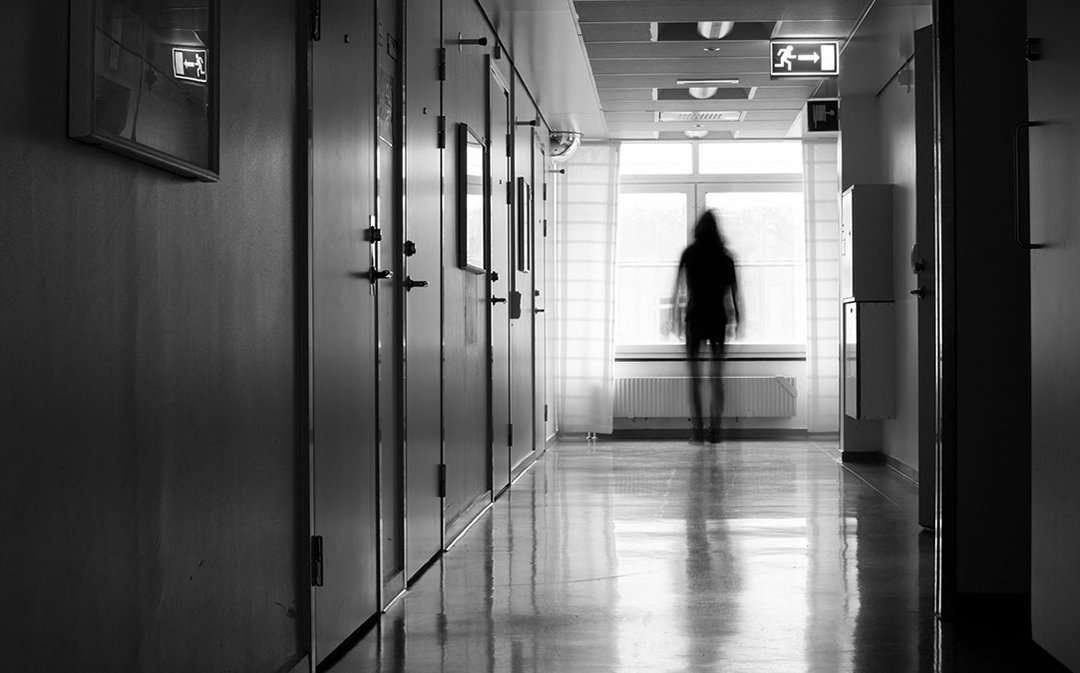 Figure in a hallway