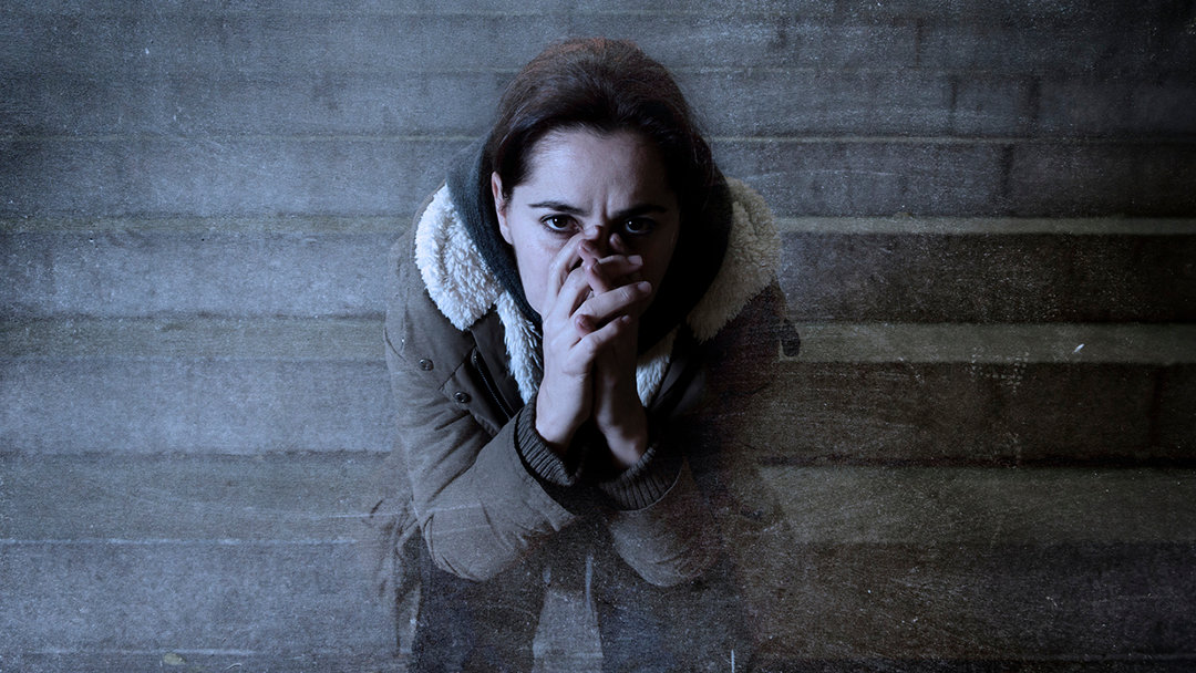 Meth addict on a staircase