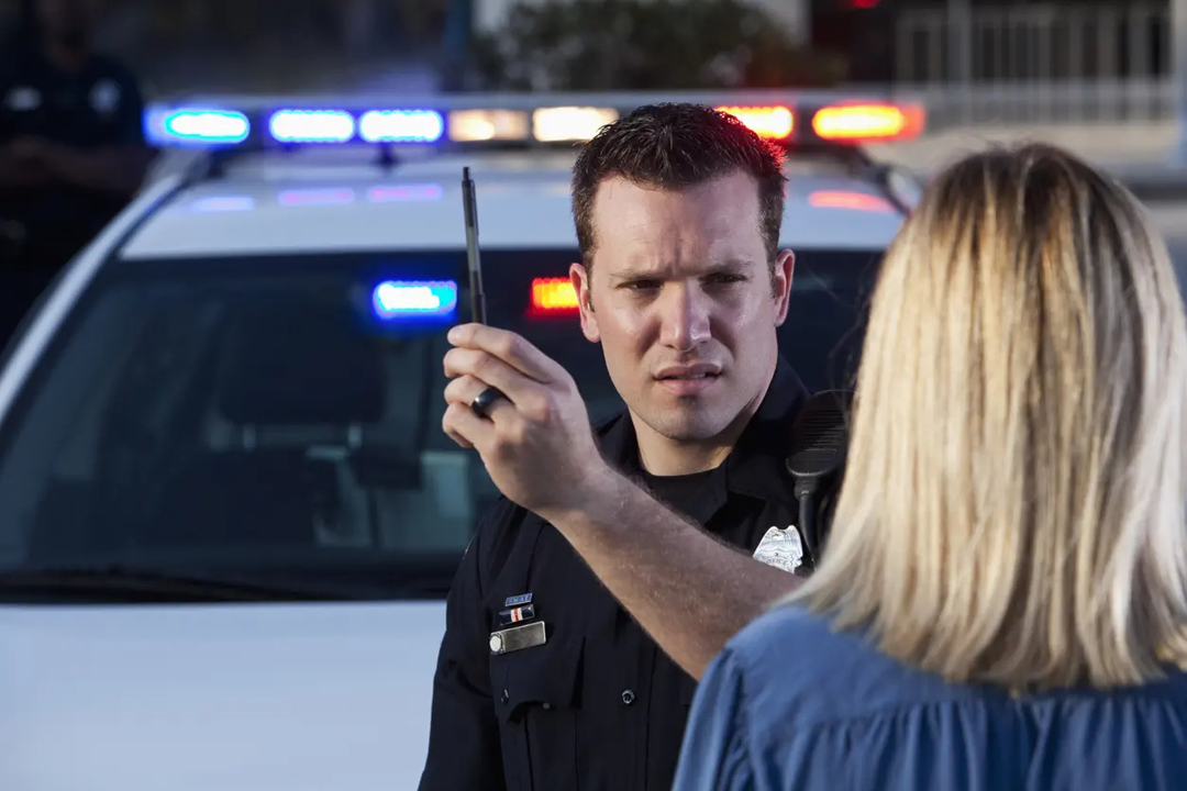 Police officer doing a sobriety test