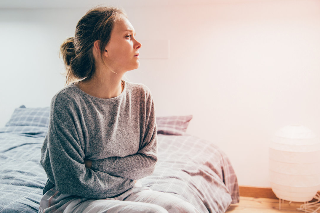Woman at home suffering from anxiety