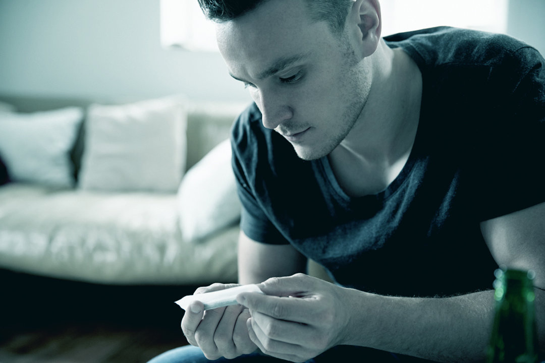 Man using weed at home