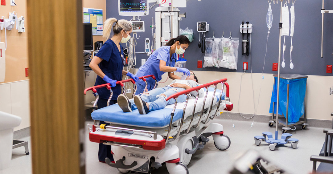 Nurses treating a patient
