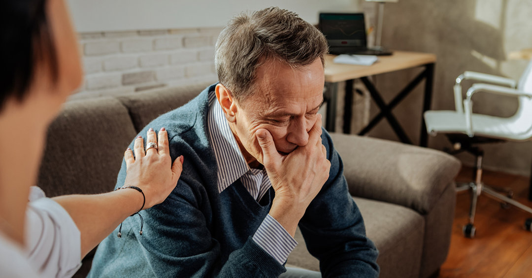 Wife helping her husband