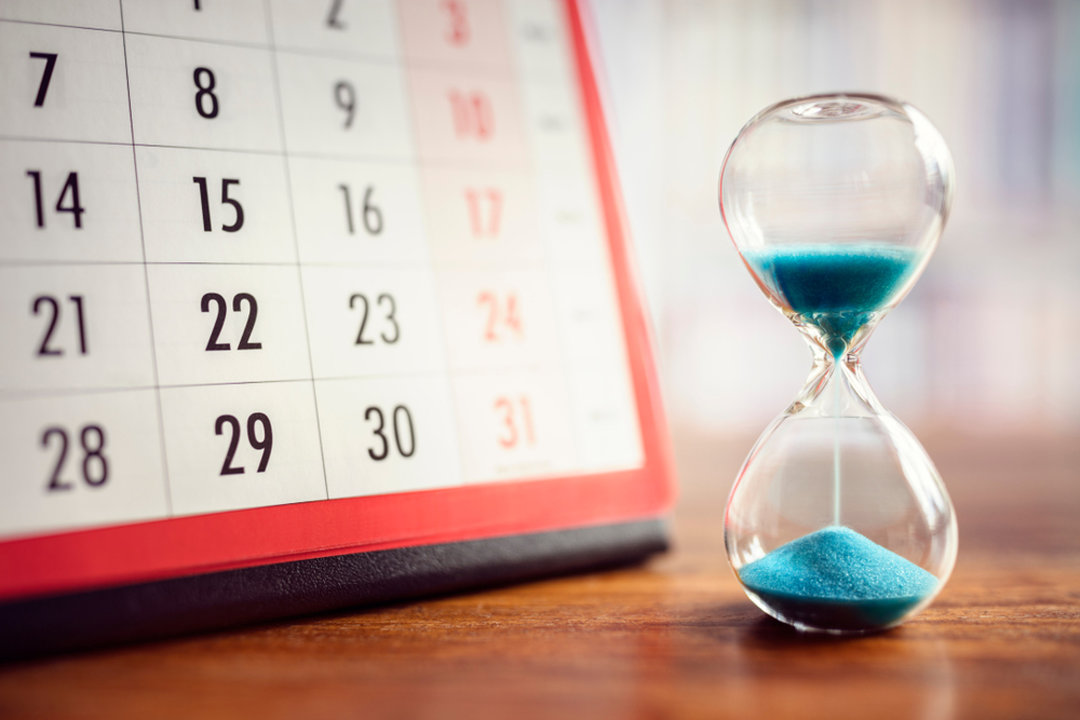 Calendar with sand clock