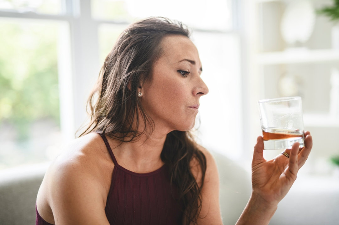Woman holding a glass
