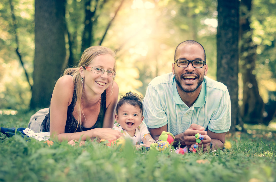 Two parents and a baby