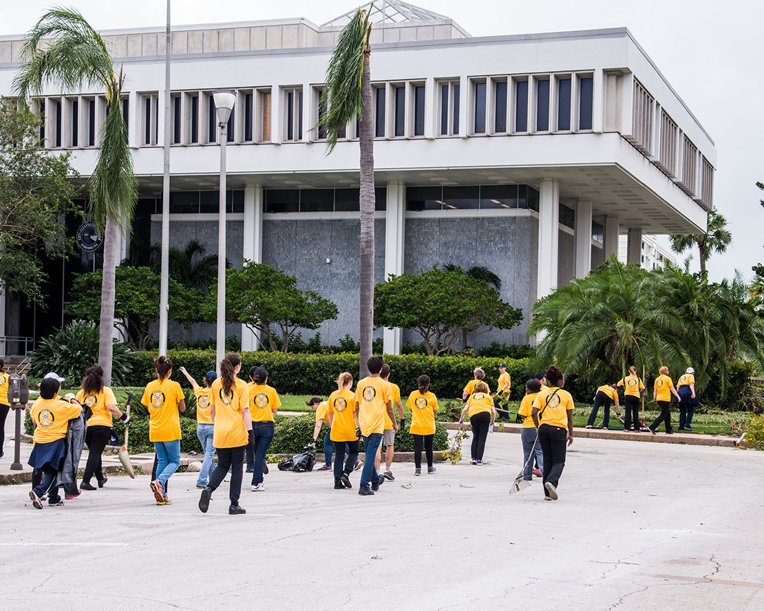 Volunteer Ministers clean up tons of storm-felled trees from Clearwater’s City Hall