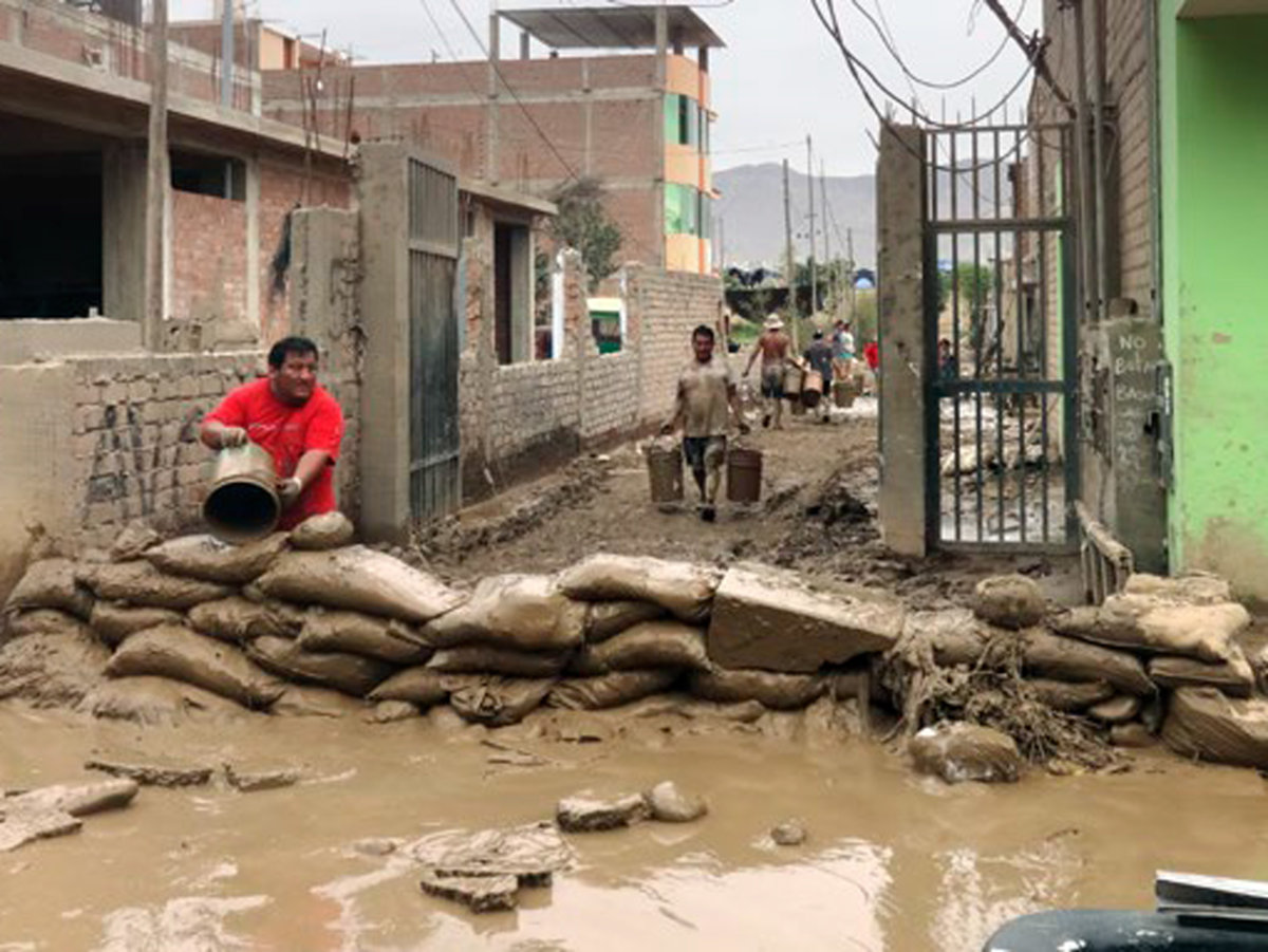Volunteer Ministers in Peru as heavy rain causes flooding and deadly