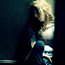Woman sitting on the floor