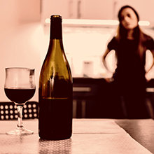 Woman with a bottle of wine