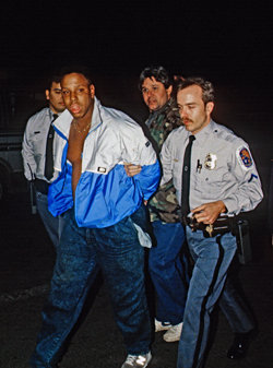 A Crack cocaine dealer being arrested in 1988 by the Maryland police