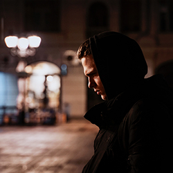 Marijuana addict on the street at night