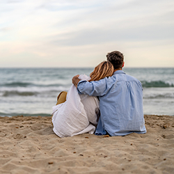 Man and a woman on the beach