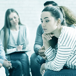 Bored woman in a meeting