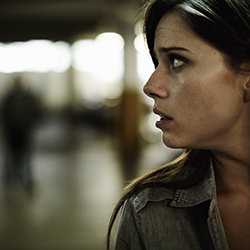 Young woman looking around