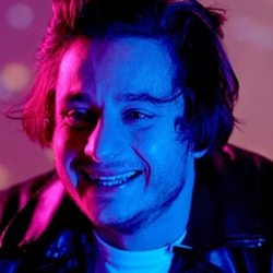 Man smiling under the influence