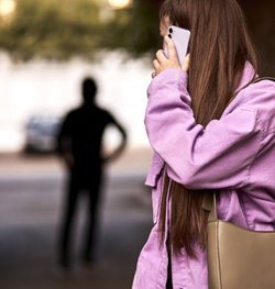 Man following a woman