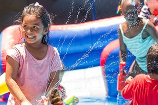 kids enjoying the water slide