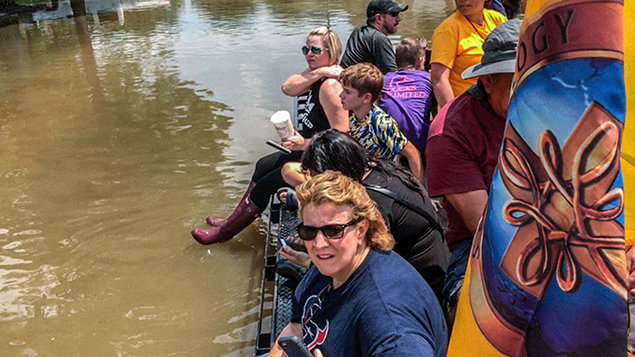 Volunteer Ministers rescued stranded Texans by canoe and boat.
