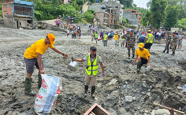 Supported by an emergency IAS grant, the Nepalese VM team clears flood debris in devastated neighborhoods in Nuwakot District. On their first day, they trained seven local volunteers as VMs and formed a new VM Group.