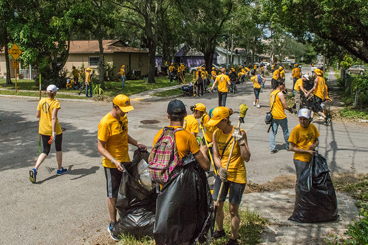Volunteer Ministers clean up the community