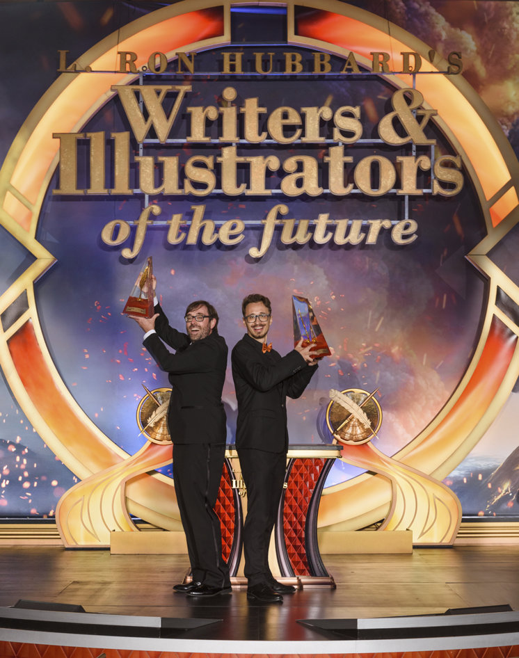 The 2026 Golden Pen awardee Michael Kuester and Golden Brush awardee Bafu.