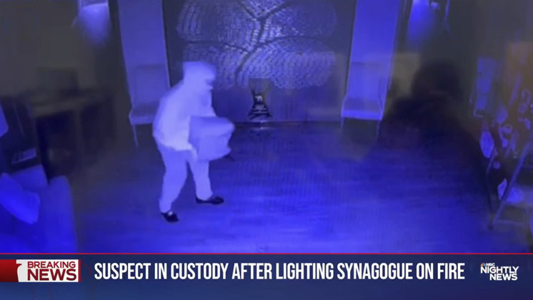 Suspect on camera burning the synagogue