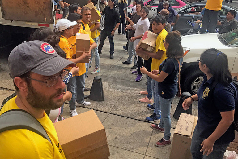 Distributing supplies collected by the Church of Scientology