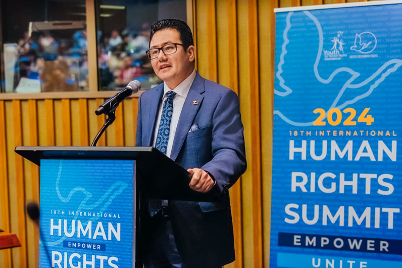 Bashir Fayaq speaking at the International Human Rights Summit.