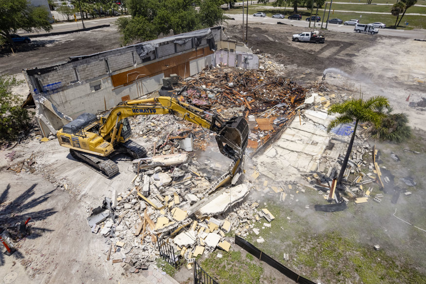 Demolition crew works to clear the site for future development.