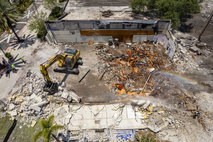 The debris is sorted into several piles for disposal. 