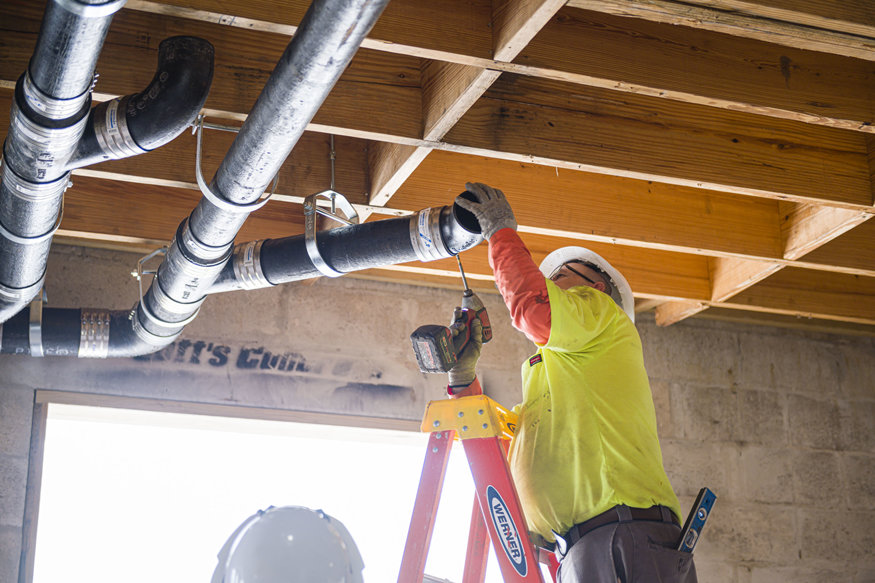 Unconnected pipes are fitted to test alignment.