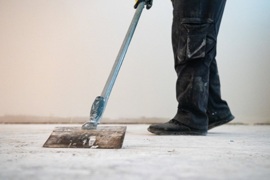 Restoration crew preparing historic bank interior flooring. 