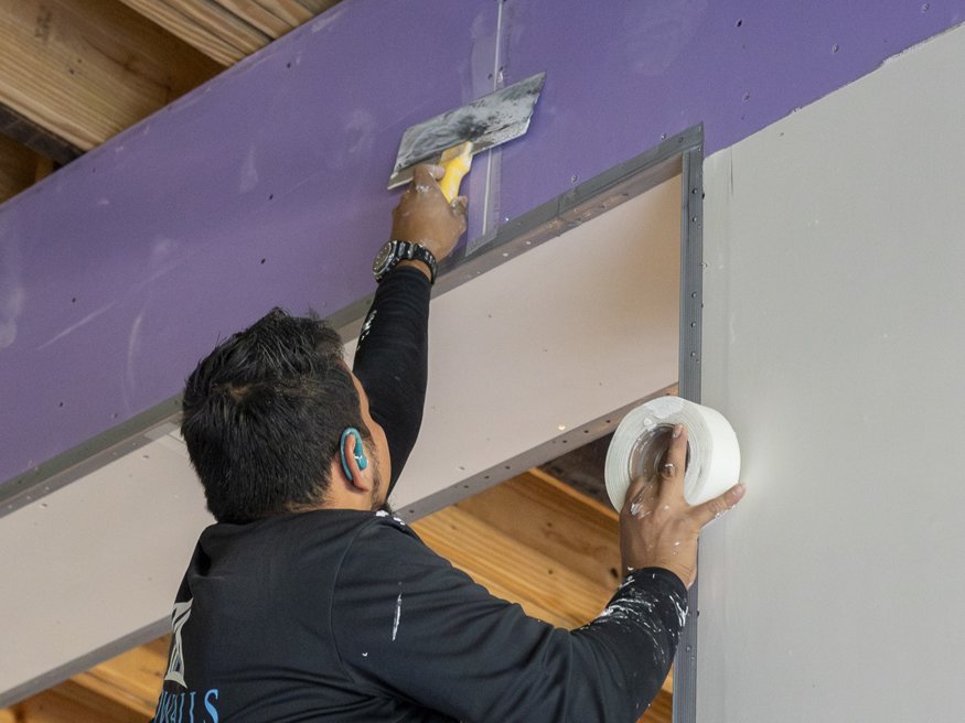 Drywall mudding in progress at Woolworth building