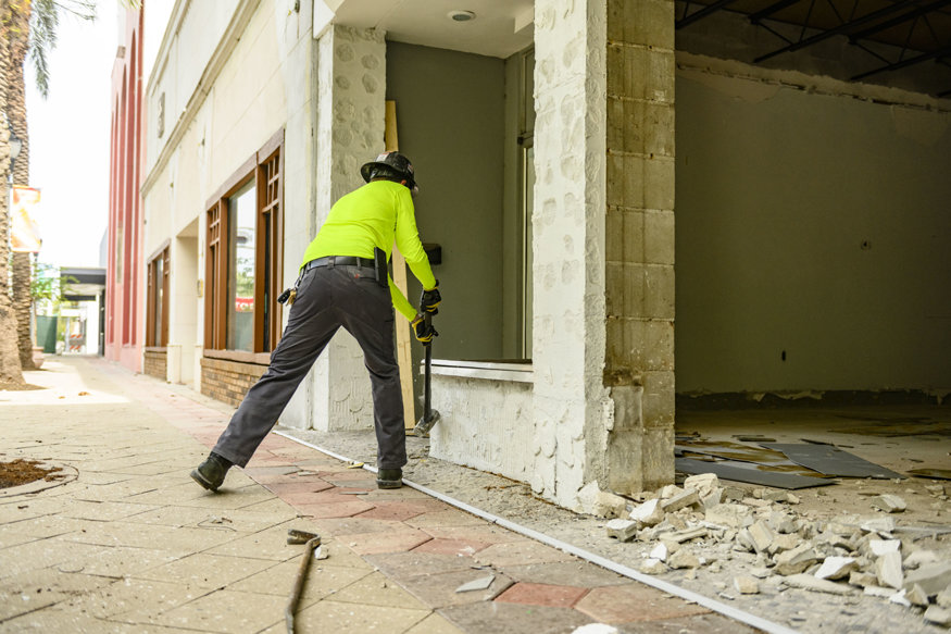 Knee walls are demolished ahead of new storefront installation.
