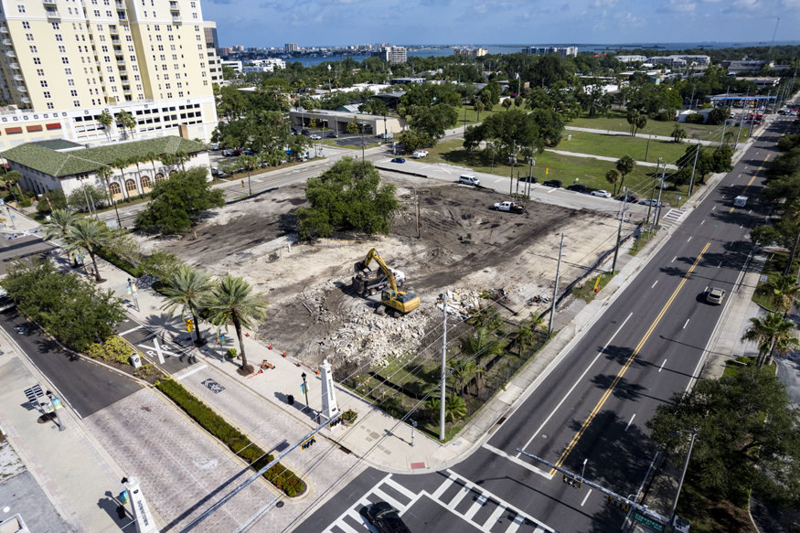 Wide aerial showing cleared Cleveland Street redevelopment parcel. 