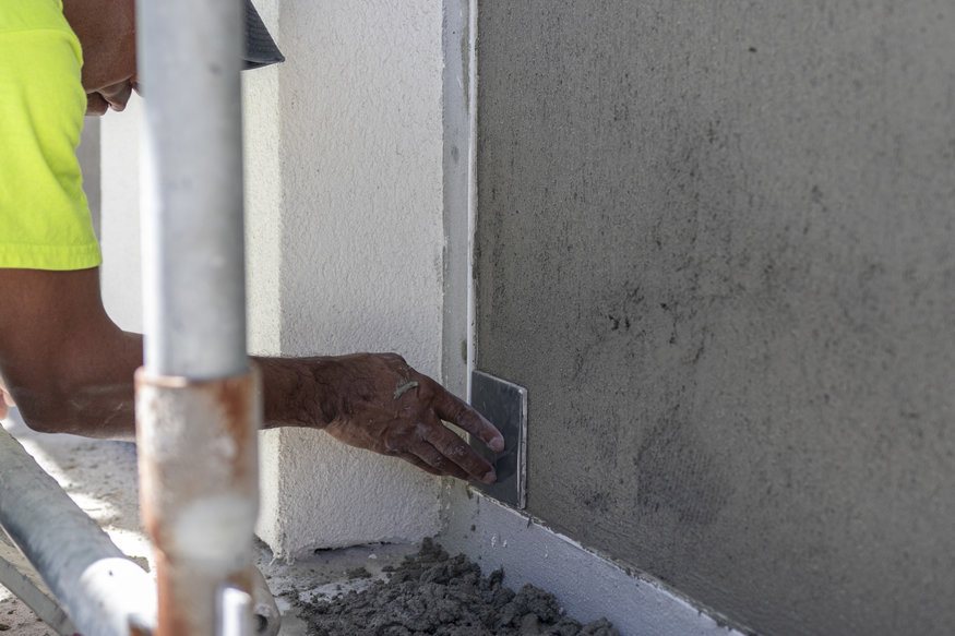 Tile alignment checked beneath Peoples Bank window recess.