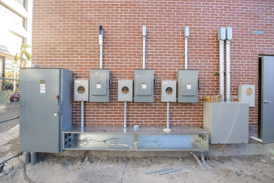 New electrical panels mounted on freshly installed brickwork behind the Telephone Building.