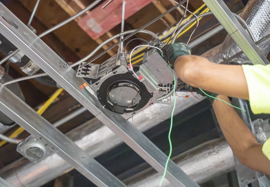 Electrical wiring connected to ceiling light fixture.