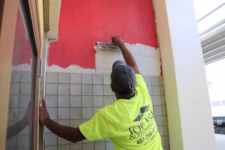 Mortar applied before tile installation.