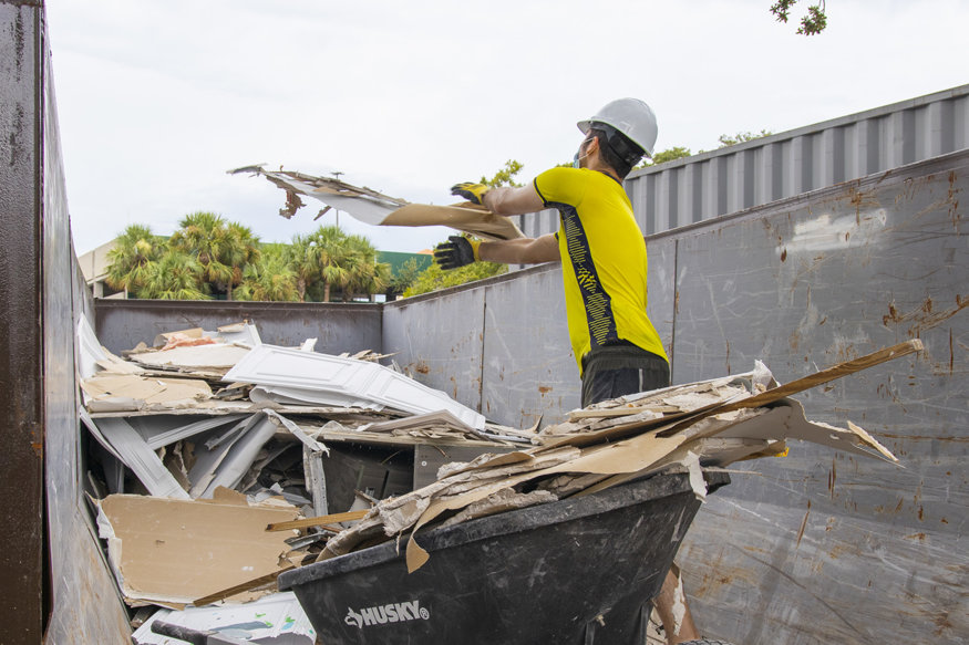 Dumpster filled with first floor demolition waste.