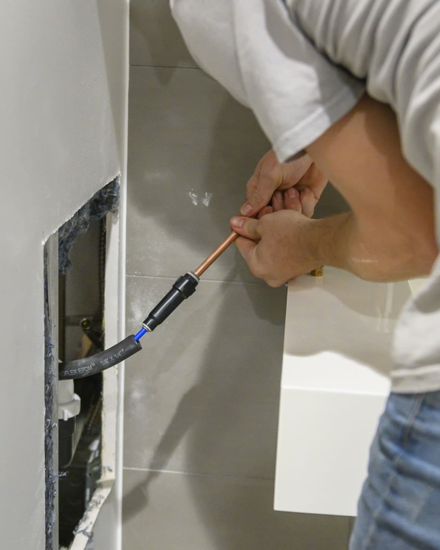 Connecting water supply to fixtures.