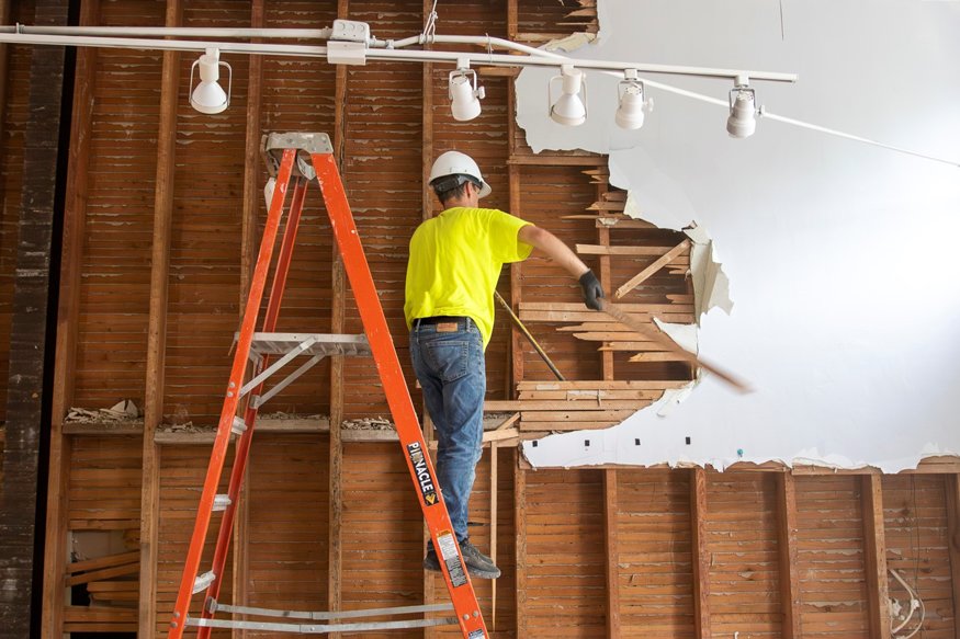 Pieces of the partition wall being demolished